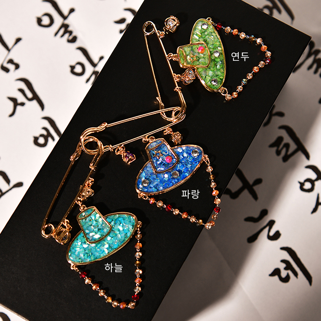 God Brooch